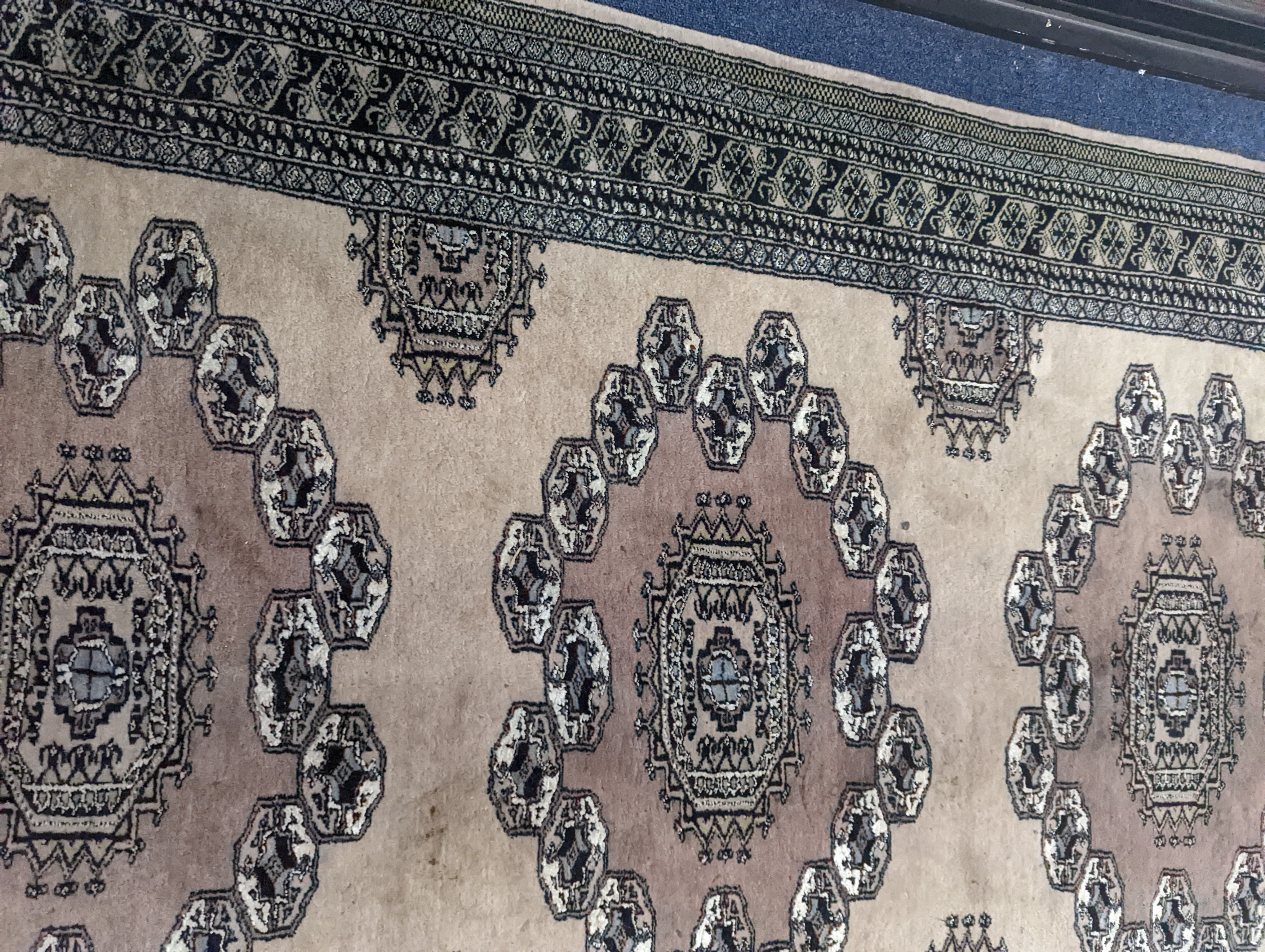 A Pakistan Bokhara style pink ground rug, 210 x 127cm
